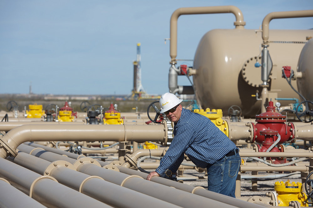 Engineer working with pipelines